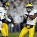 Michigan sophomore quarterback Tate Forcier and sophomore quarterback Denard Robinson dance on the field during warm ups at Beaver Stadium in State College, Penn. on Saturday. Penn State beat Michigan, 41-31. Melanie Maxwell I AnnArbor.com